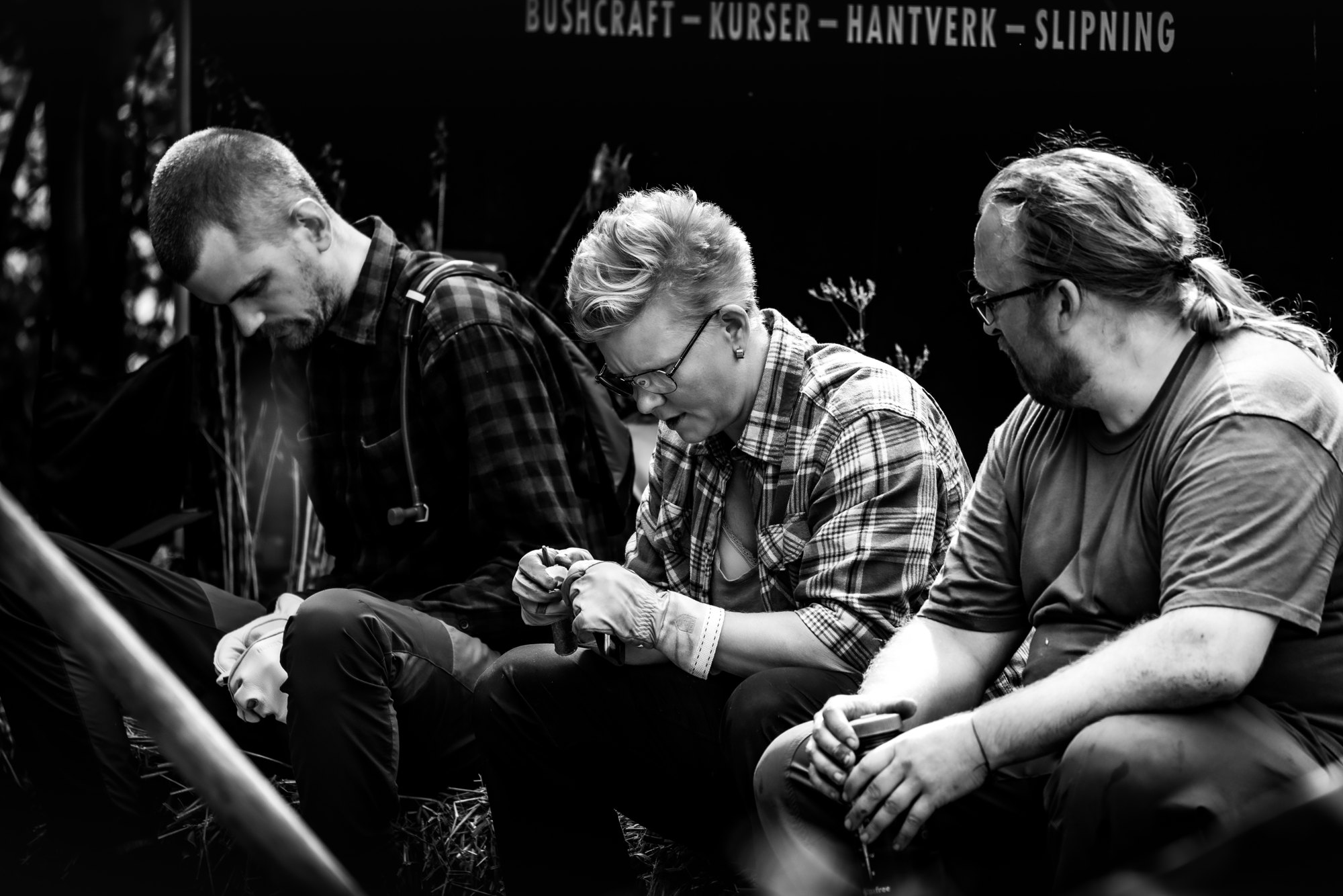 Tre deltagare i ett nära samtal under Workshop Weekend 2022